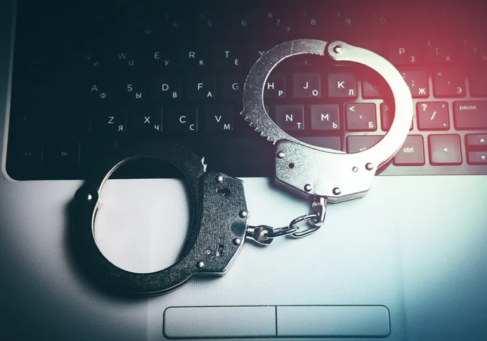 032124_laptop_handcuffs